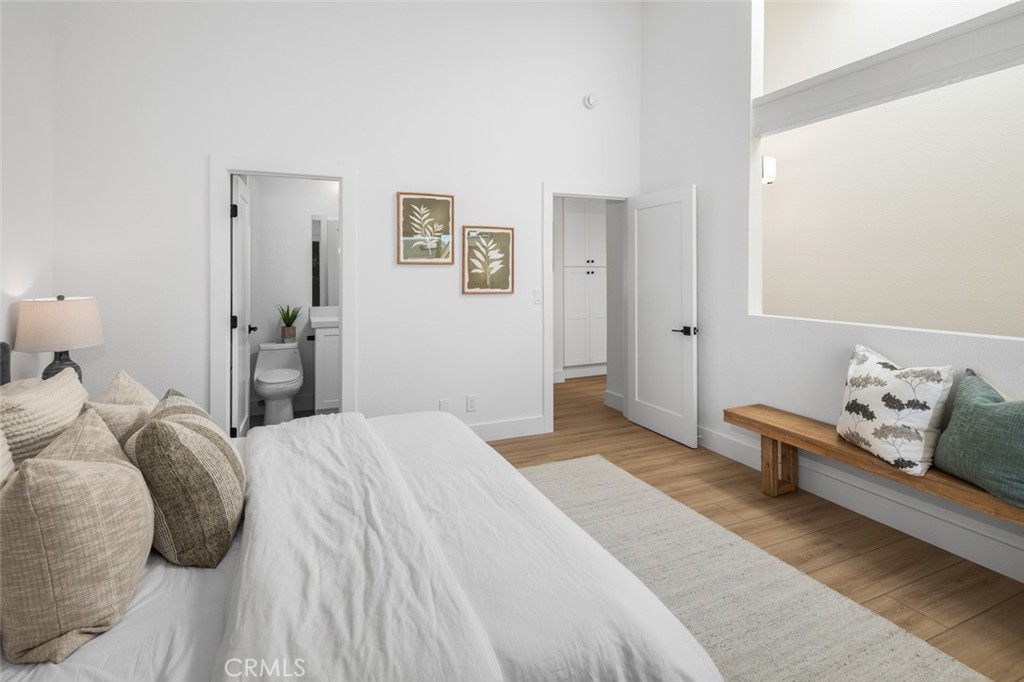 3905 Hazard Avenue, Unit B22 Santa Ana, CA 92703 - Photo 17 of 30 a bedroom with a bed and a couch