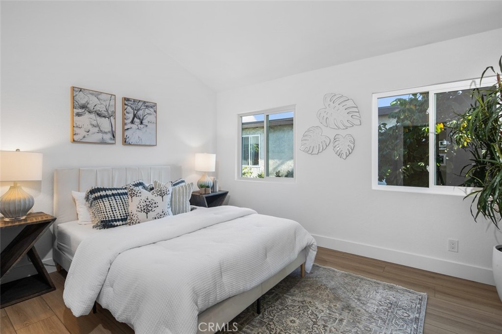 3905 Hazard Avenue, Unit B22 Santa Ana, CA 92703 - Photo 21 of 30 a bedroom with a bed and a window