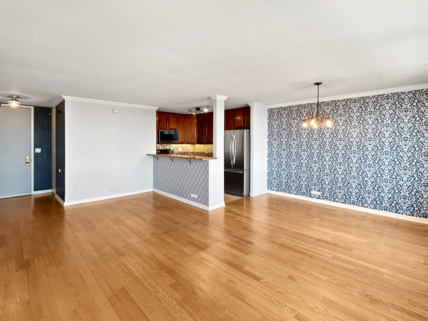 655 West Irving Park Road, Unit 3608 Chicago, IL 60613 - Photo 10 of 20 a view of a livingroom with a flat screen tv