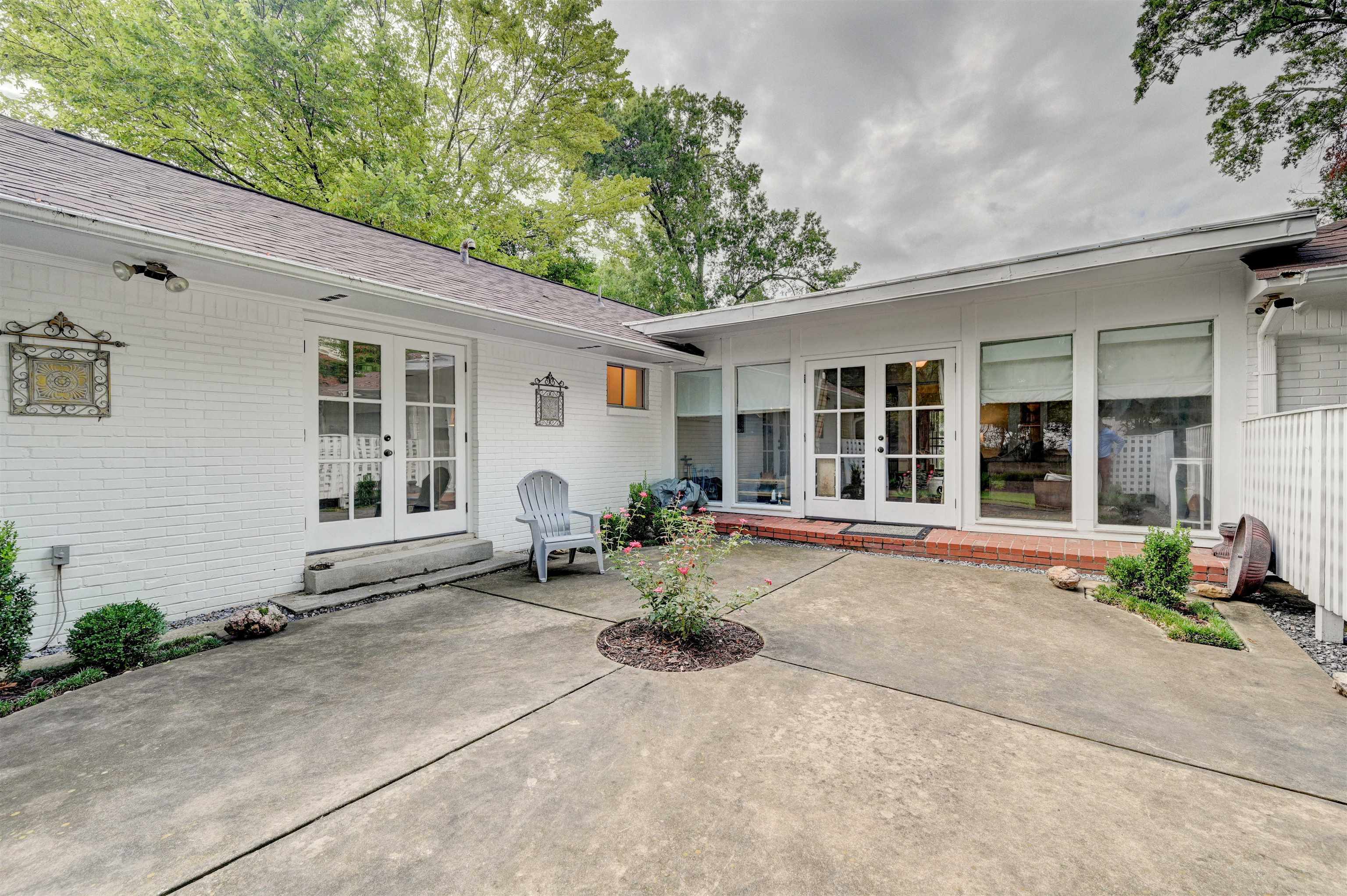 5265 Shady Grove Road Memphis, TN 38120 - Photo 25 of 25 a front view of a house with a patio