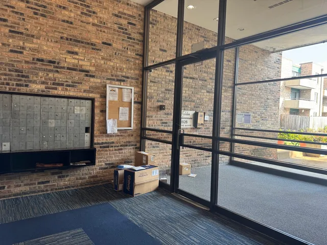 a view of front door with outdoor seating