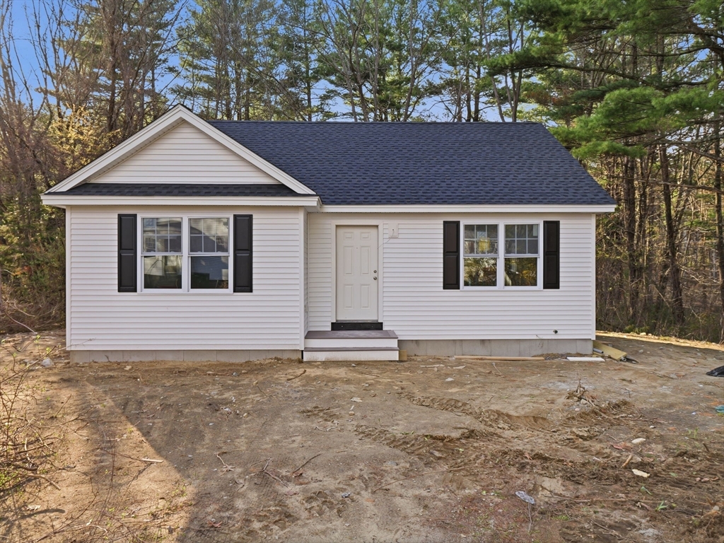 285 West Meadow Road Lowell, MA 01854 - Photo 29 of 32 a house with trees in the background