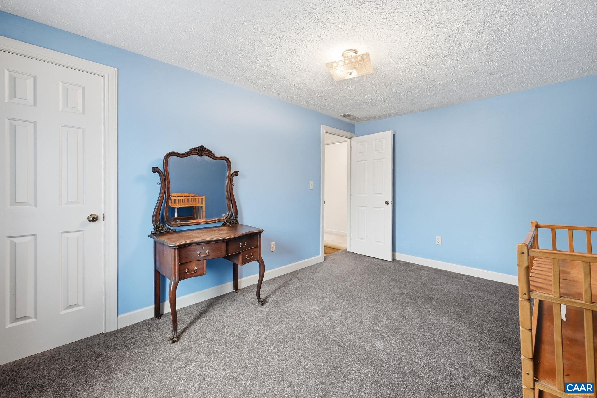 10002 Dyke Road Stanardsville, VA 22973 - Photo 33 of 73 a room with furniture and a window