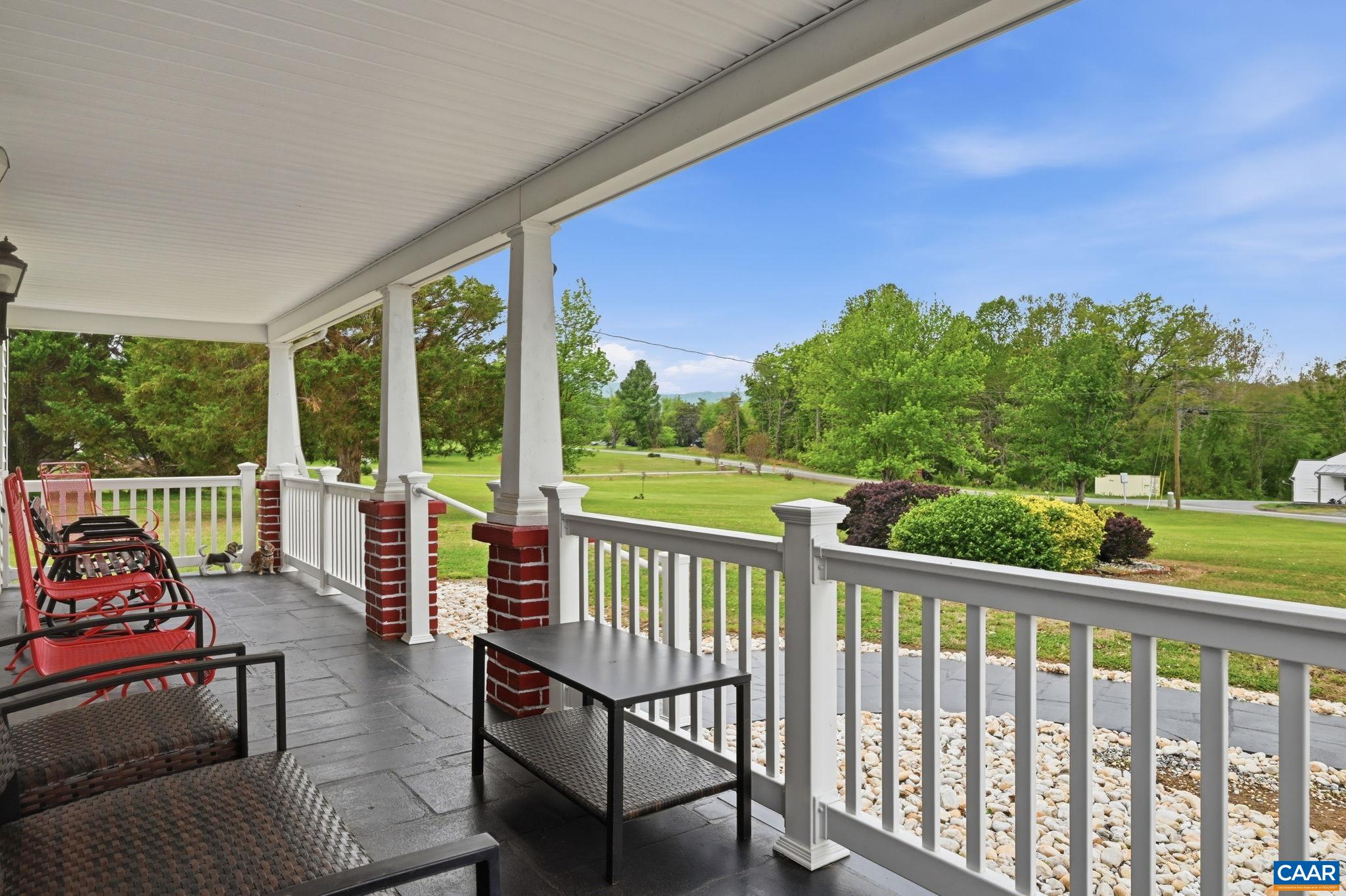 10002 Dyke Road Stanardsville, VA 22973 - Photo 43 of 73 a view of a two chairs in the balcony
