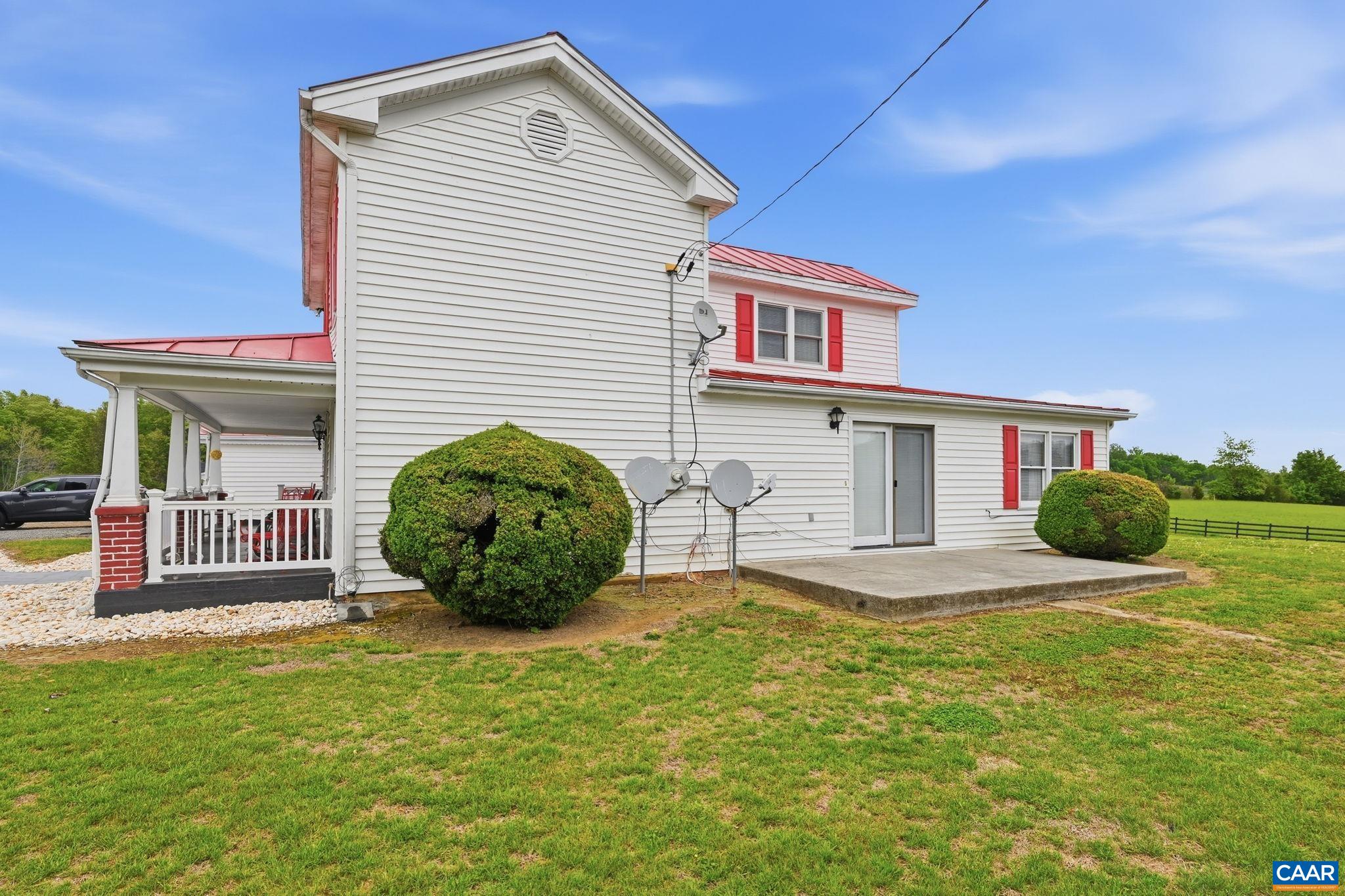 10002 Dyke Road Stanardsville, VA 22973 - Photo 44 of 73 a view of a house with a backyard