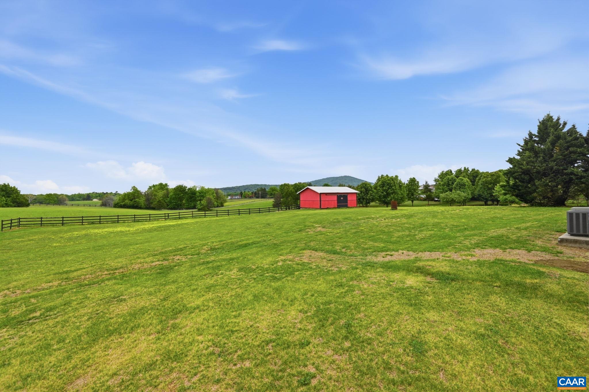 10002 Dyke Road Stanardsville, VA 22973 - Photo 45 of 73 a view of a golf course with a garden