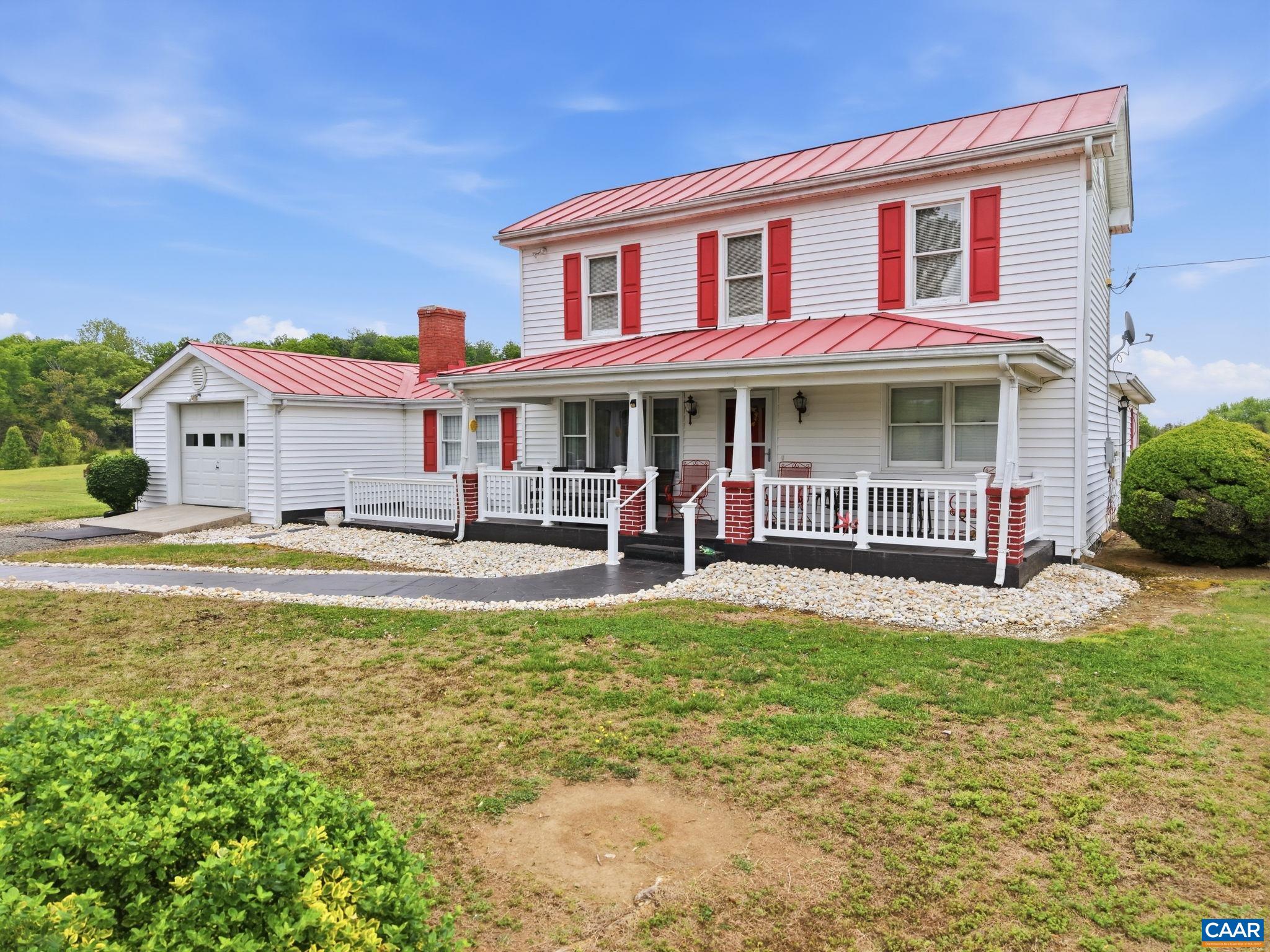 10002 Dyke Road Stanardsville, VA 22973 - Photo 48 of 73 a view of house with a yard balcony