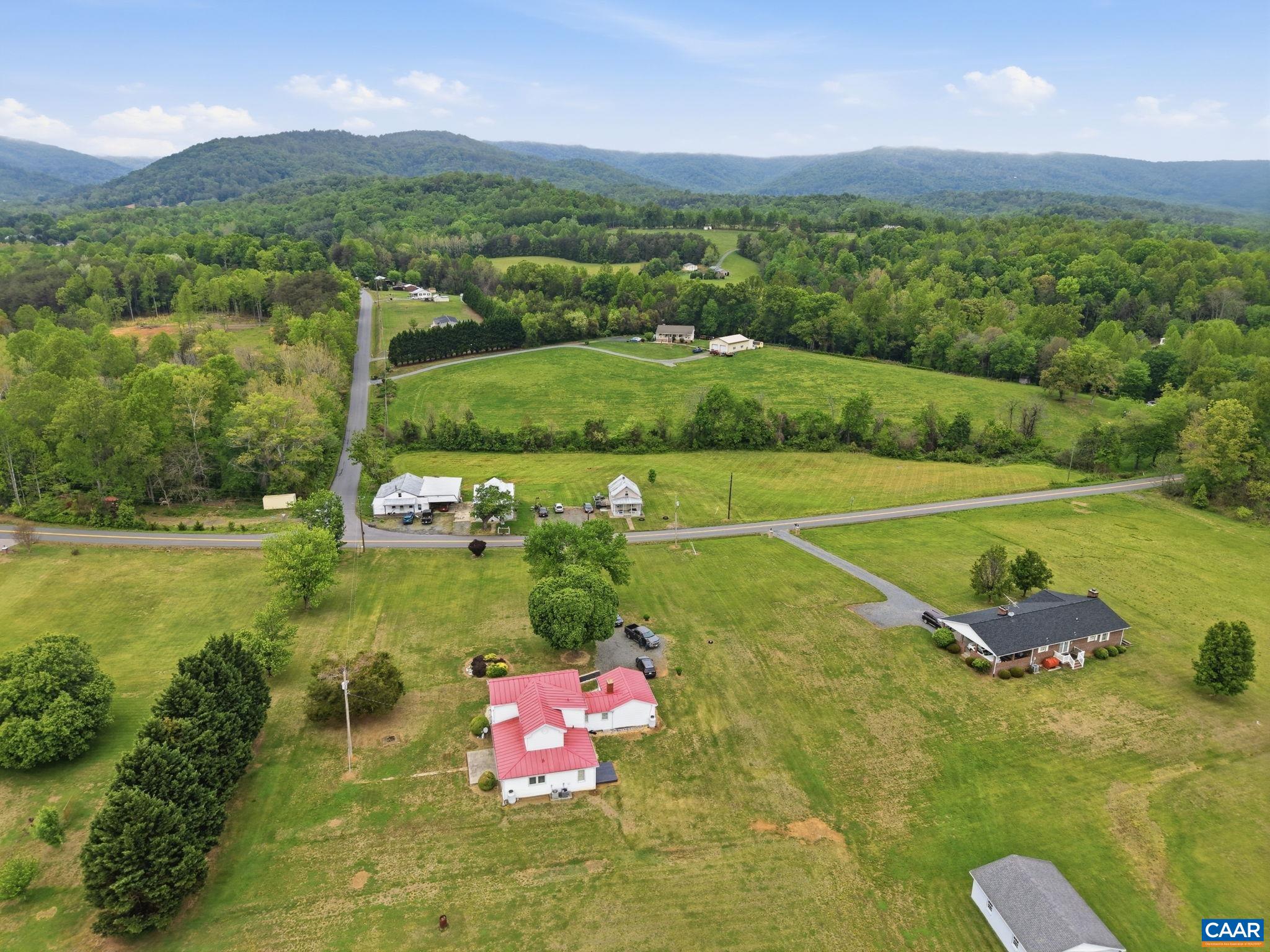 10002 Dyke Road Stanardsville, VA 22973 - Photo 54 of 73 a view of a town with mountains in the background