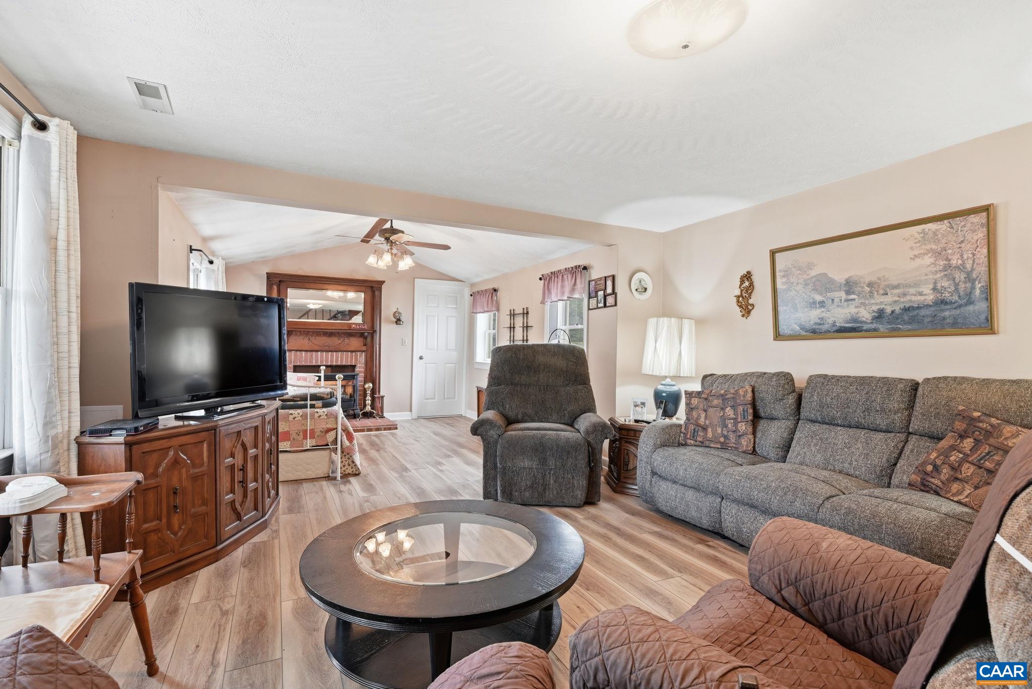 10002 Dyke Road Stanardsville, VA 22973 - Photo 6 of 73 a living room with furniture and a flat screen tv