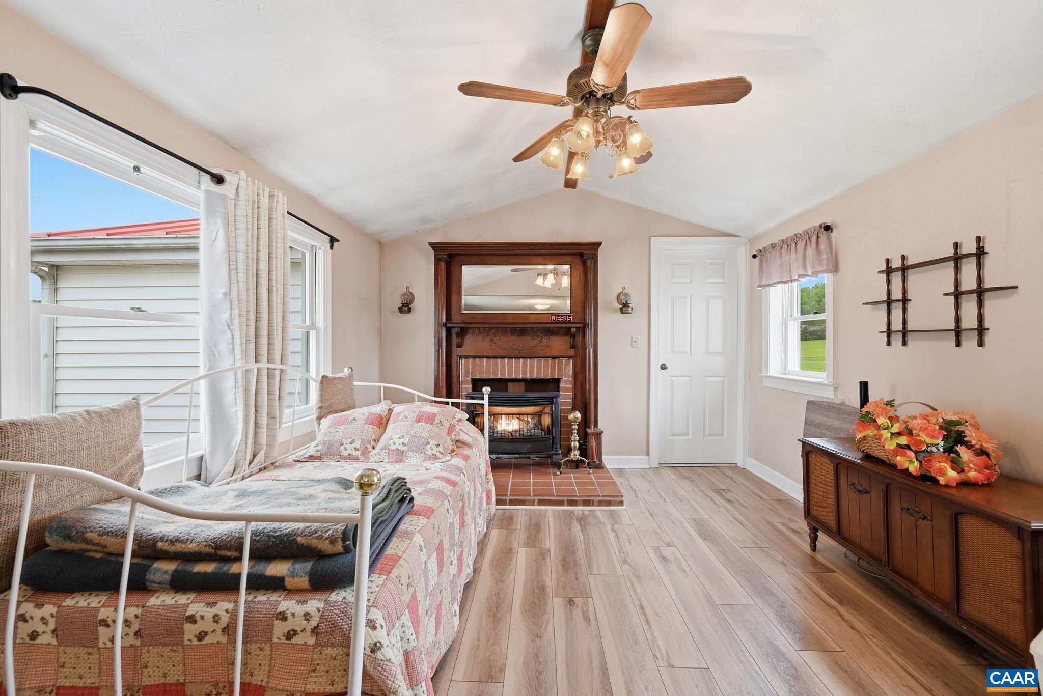 10002 Dyke Road Stanardsville, VA 22973 - Photo 8 of 73 a bedroom with furniture and wooden floor