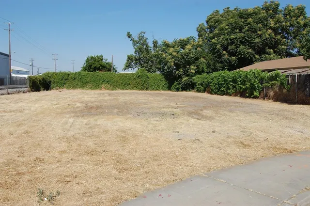 a view of a backyard of a house