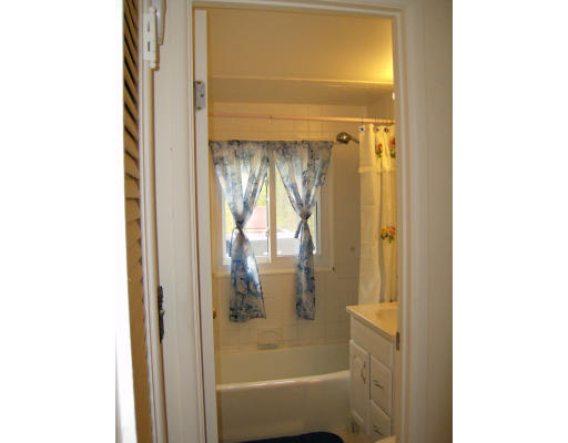 29 Dodge Road Boston, MA 02136 - Photo 6 of 15 a bathroom with a glass shower door
