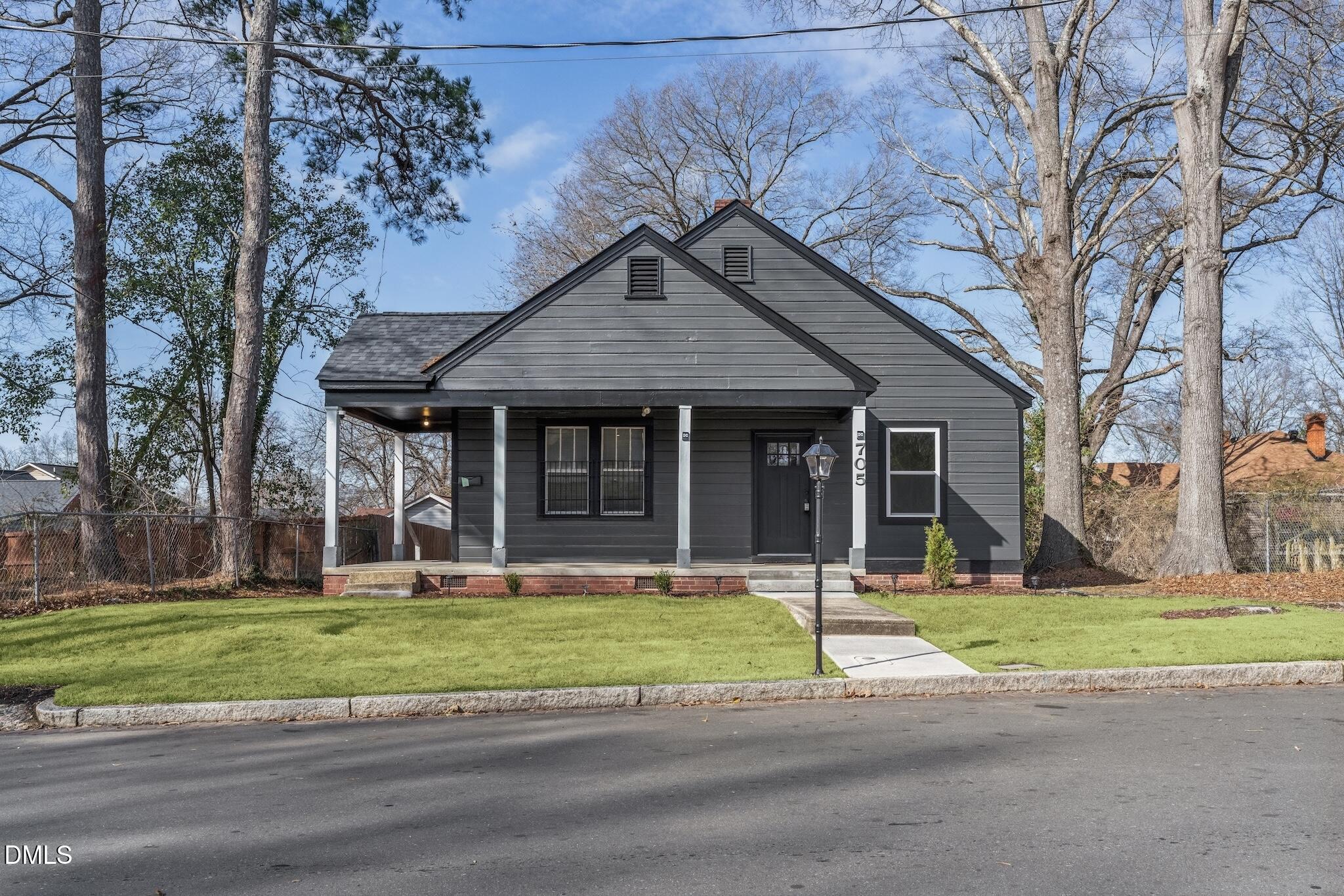 705 North Driver Street Durham, NC 27703 - Photo 2 of 46 a view of a house with a yard