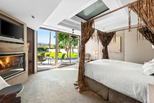 a spacious bathroom with a tub shower and sink