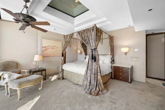 a bedroom with a bed and a large cabinets