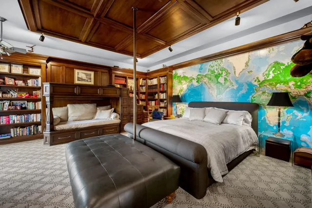 a kitchen with a refrigerator table and chairs