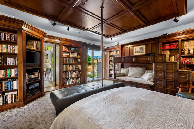 a bathroom with a granite countertop shower a mirror and a shower