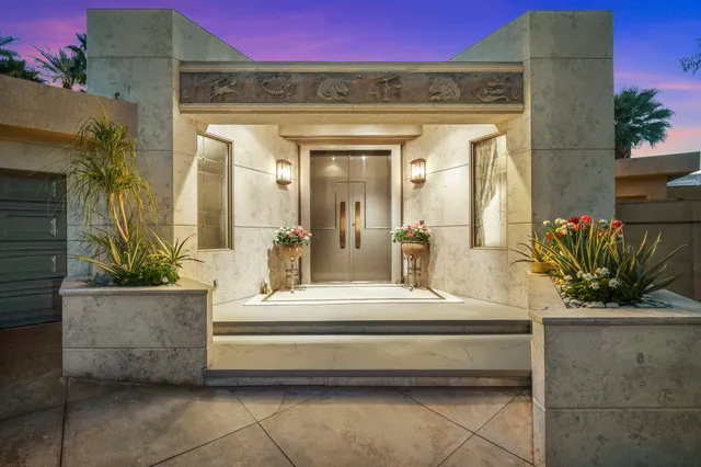 a view of a livingroom with furniture and windows