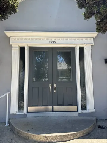 a view of a swimming pool with a yard