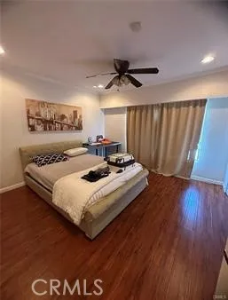 a bedroom with a bed and a table