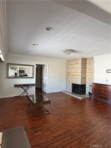a view of livingroom with furniture and wooden floor