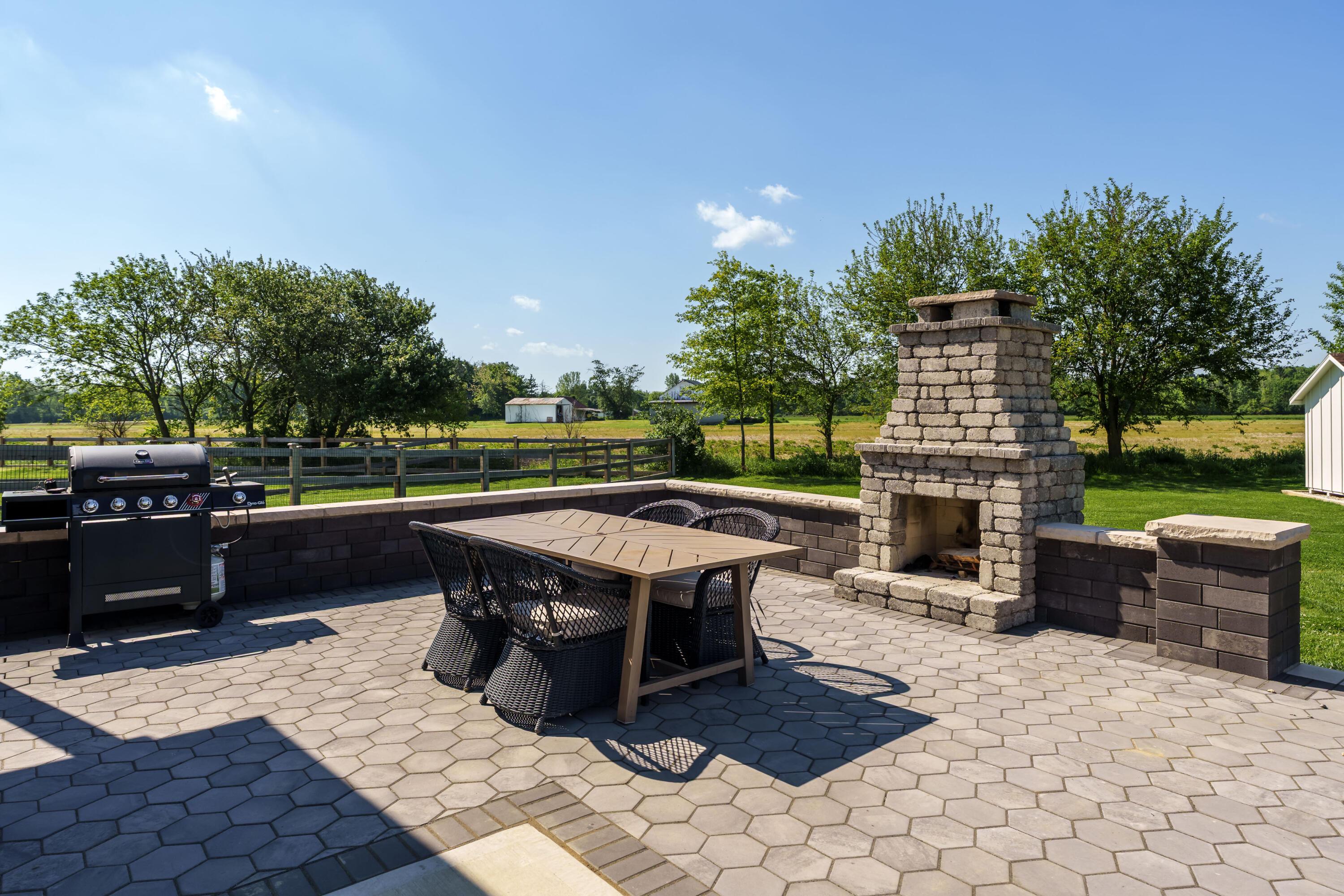 7308 Concord Road Delaware, OH 43015 - Photo 58 of 73 Paver Patio with Fireplace