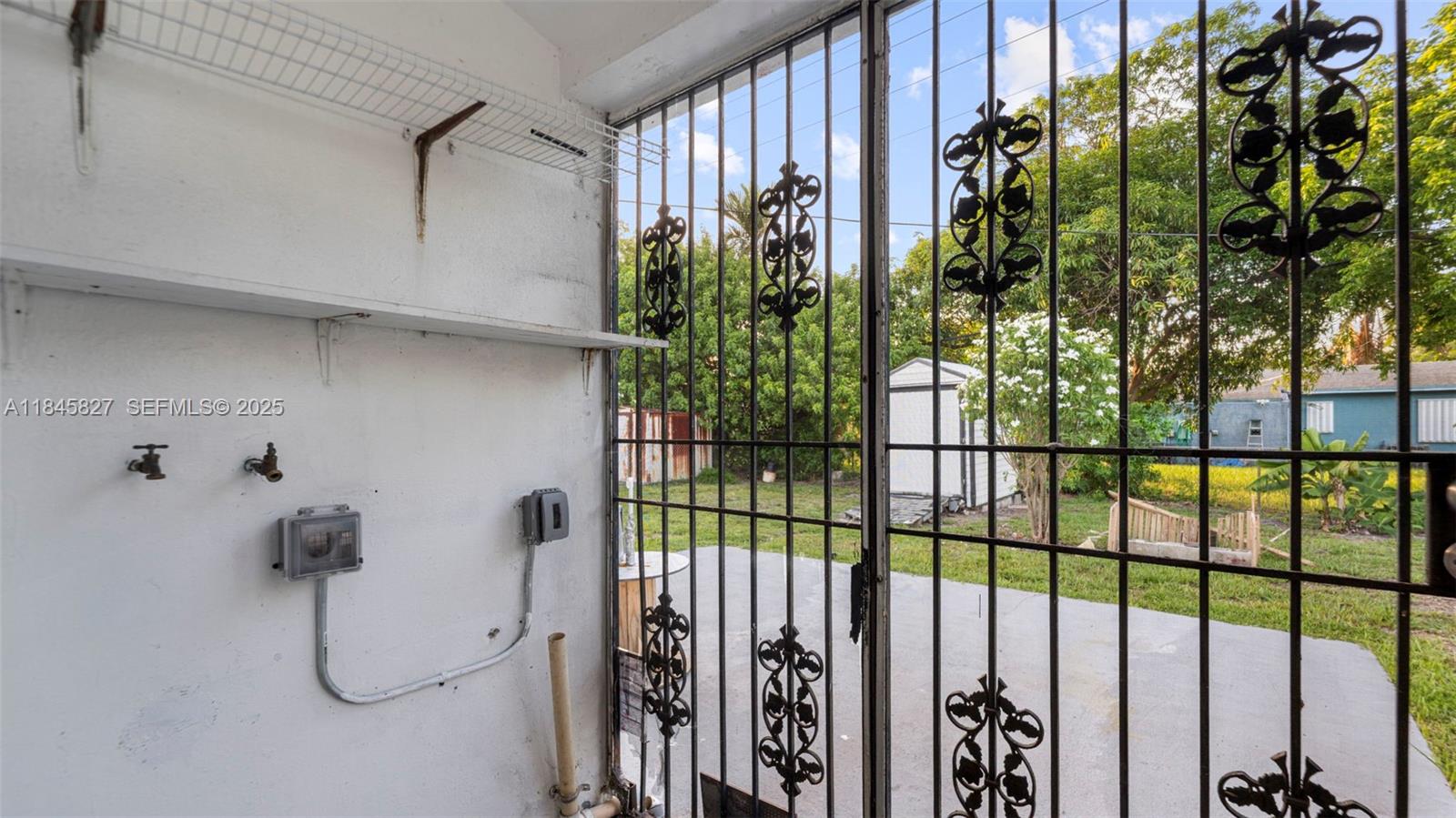 1235 Northwest 86th Street Miami, FL 33147 - Photo 16 of 37 a bathroom with a shower