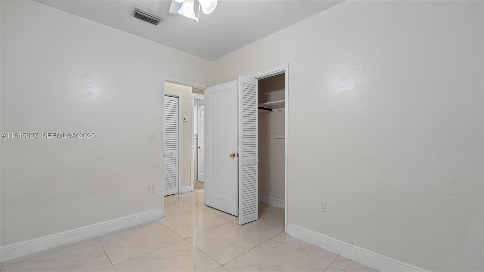 1235 Northwest 86th Street Miami, FL 33147 - Photo 19 of 37 a view of an empty room