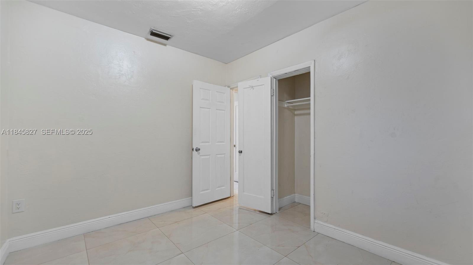 1235 Northwest 86th Street Miami, FL 33147 - Photo 23 of 37 a view of an empty room