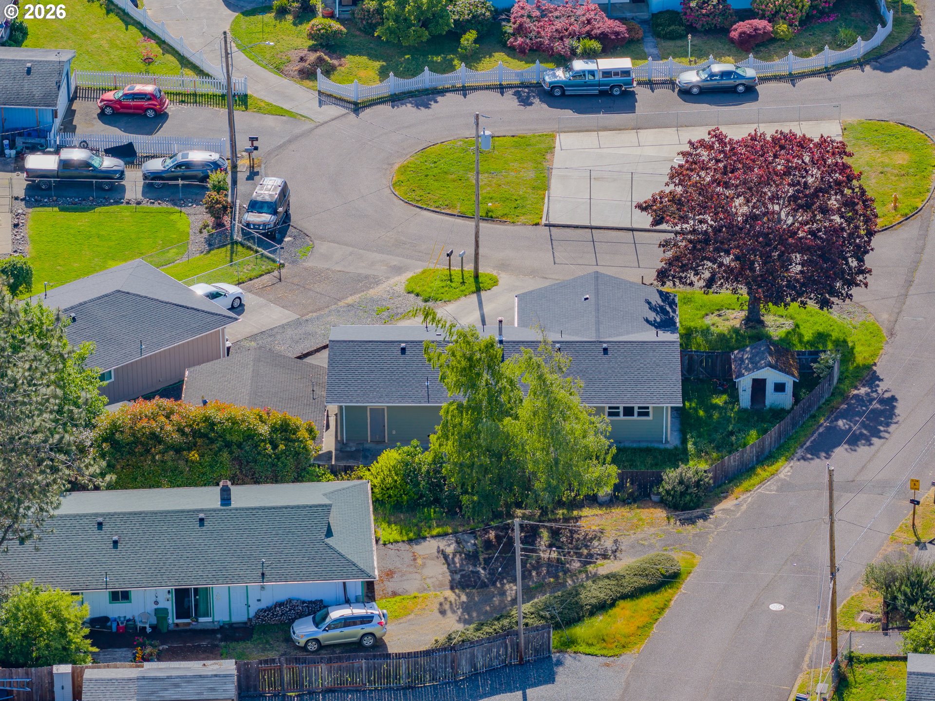 1816 Sunset Court Myrtle Point, OR 97458 - Photo 14 of 42 an aerial view of a house with a swimming pool patio and outdoor seating