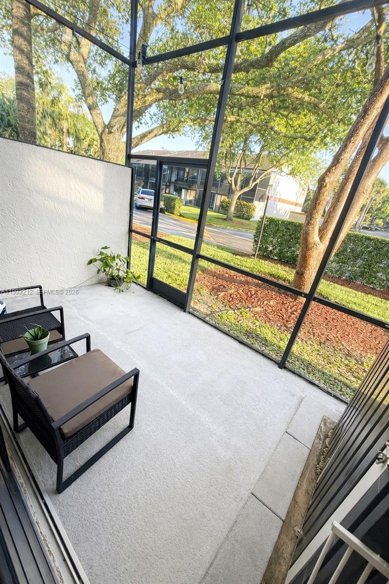 4321 Southwest 70th Terrace Davie, FL 33314 - Photo 14 of 15 a view of backyard with a deck and wooden floor