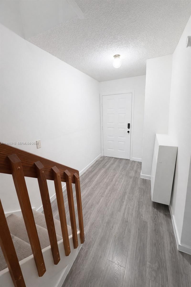 4321 Southwest 70th Terrace Davie, FL 33314 - Photo 2 of 15 a view of wooden floor and windows in a room