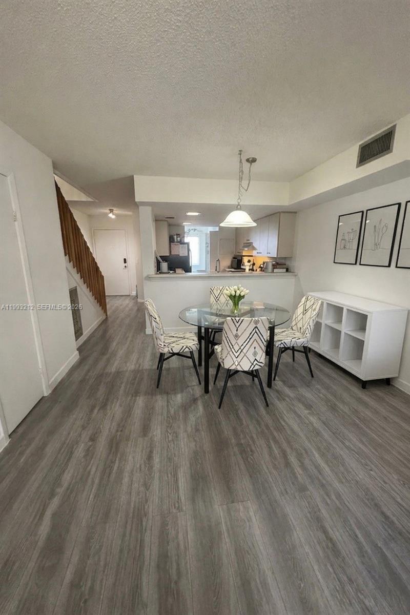 4321 Southwest 70th Terrace Davie, FL 33314 - Photo 6 of 15 a living room with furniture and a wooden floor
