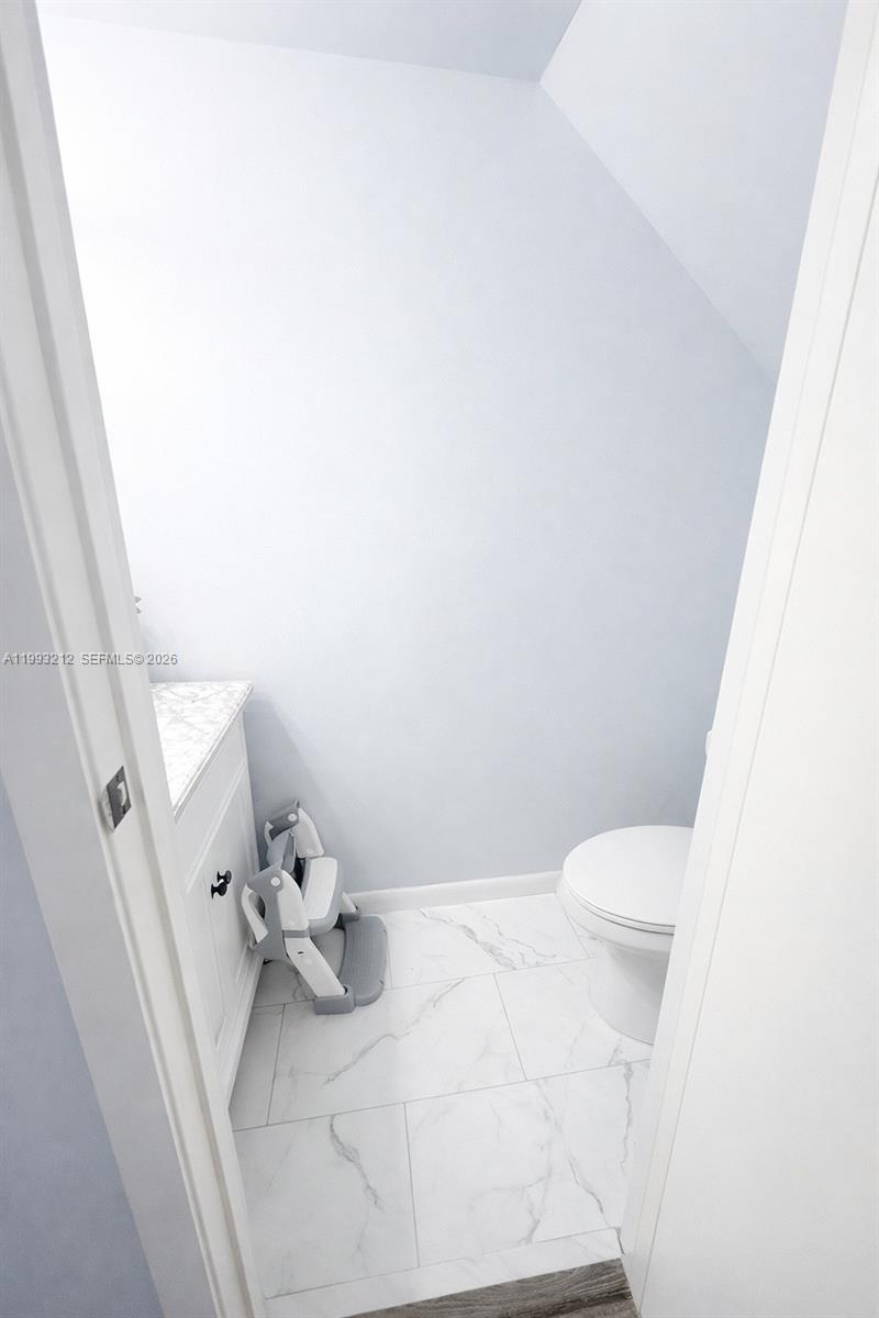 4321 Southwest 70th Terrace Davie, FL 33314 - Photo 8 of 15 a bathroom with a toilet