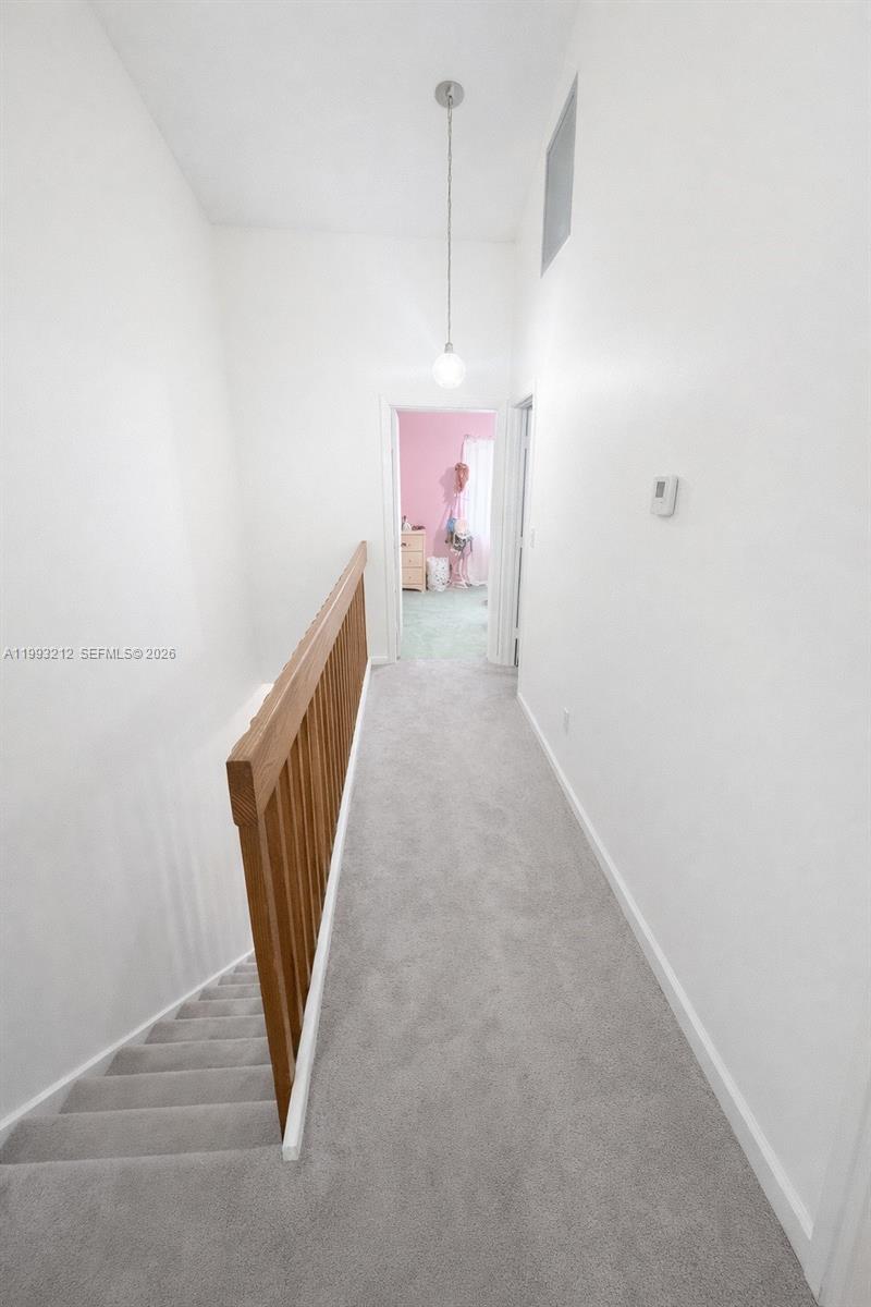 4321 Southwest 70th Terrace Davie, FL 33314 - Photo 9 of 15 a view of a hallway with staircase
