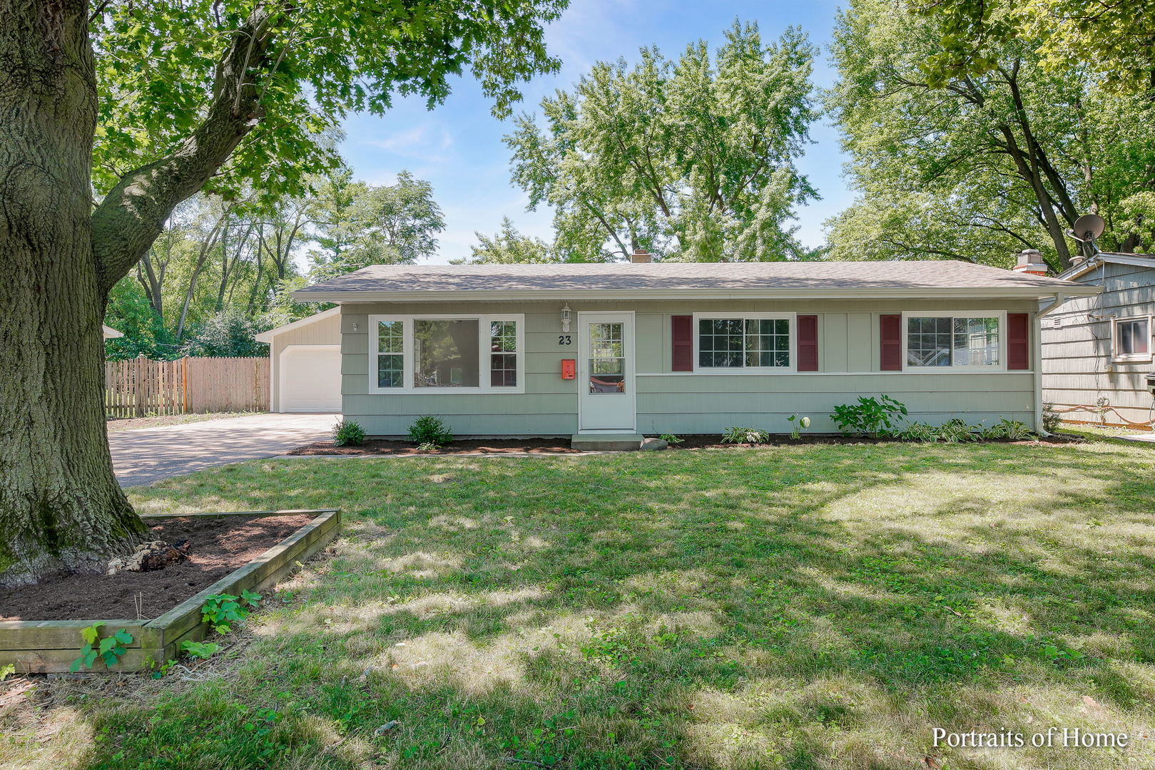 front view of a house with a yard