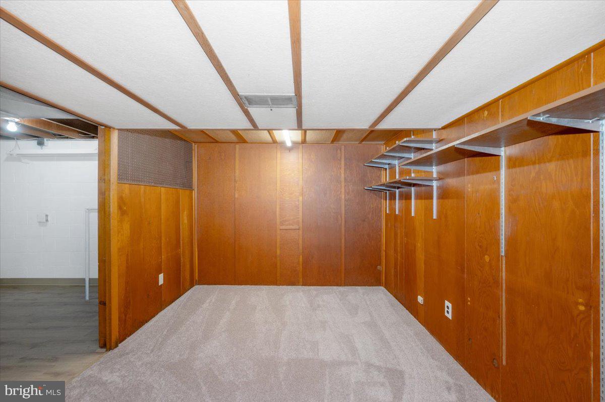 10508 Sweepstakes Road Damascus, MD 20872 - Photo 30 of 46 a view of a room with wooden walls