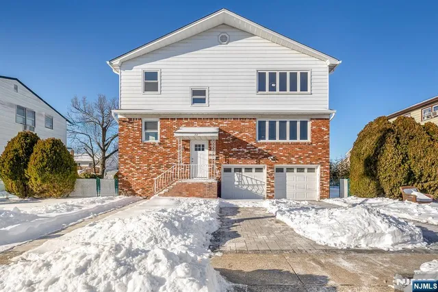 a view of a house with snow