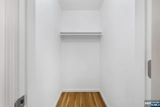 a view of a room with rack on the wall