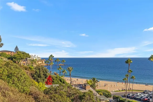 a view of a yard and ocean view