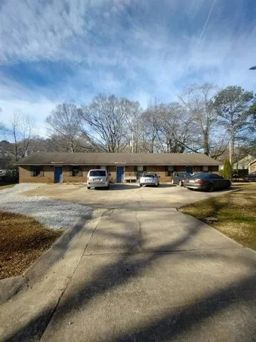 a view of a street with trees