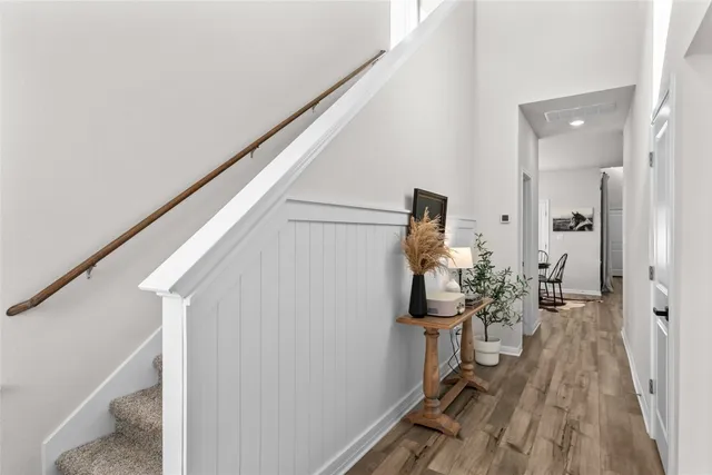 a room with furniture and wooden floor