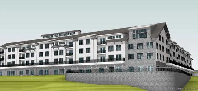 a view of a tall building from a balcony