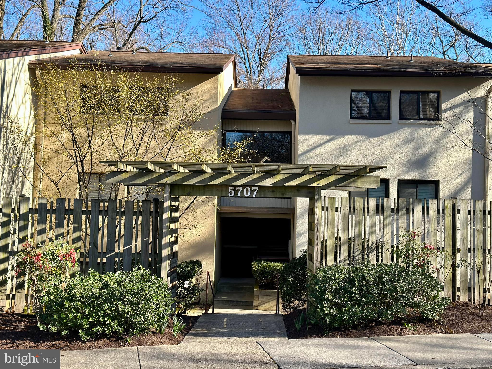 5707 Harpers Farm Road, Unit A Columbia, MD 21044 - Photo 1 of 30 a front view of a house with a yard