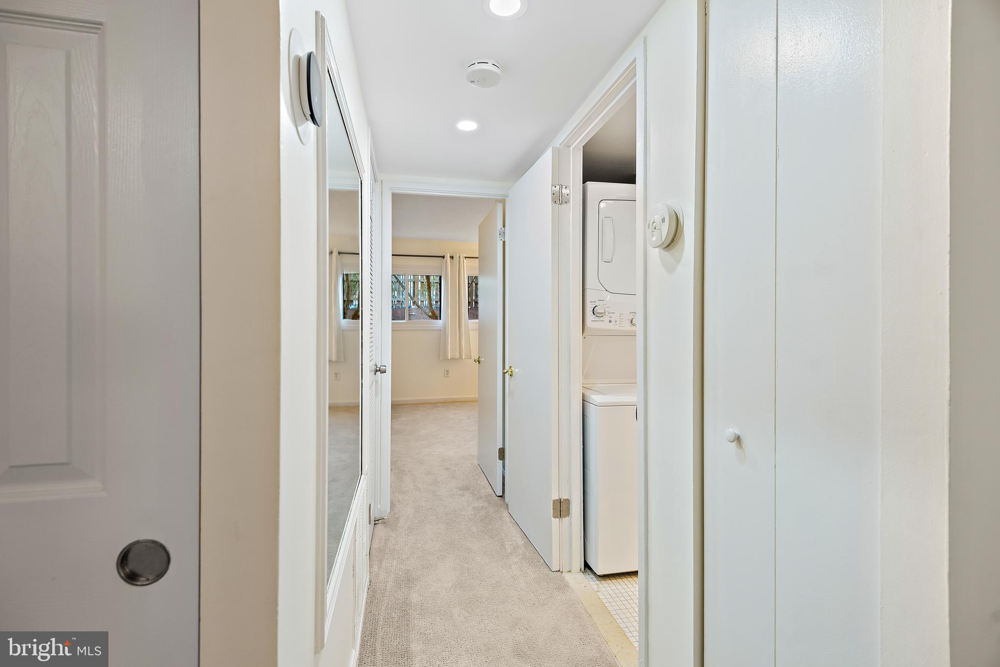 5707 Harpers Farm Road, Unit A Columbia, MD 21044 - Photo 17 of 30 a view of a hallway with wooden floor