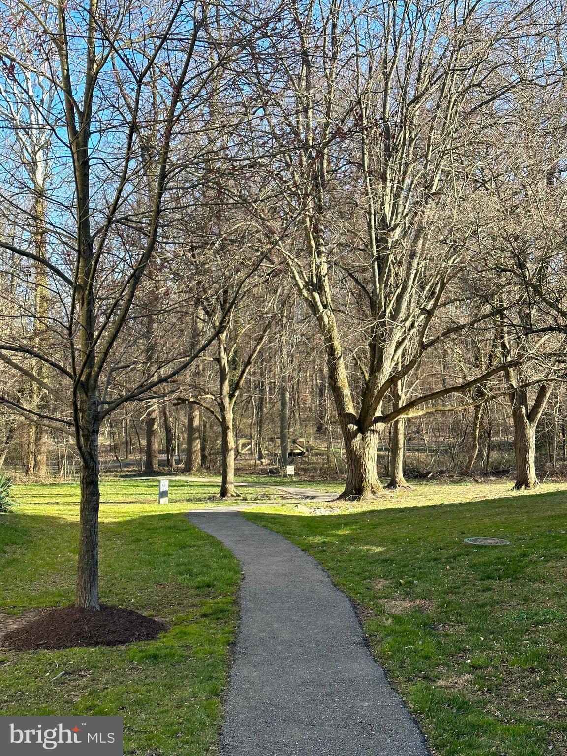 5707 Harpers Farm Road, Unit A Columbia, MD 21044 - Photo 27 of 30 a huge green field with lots of trees