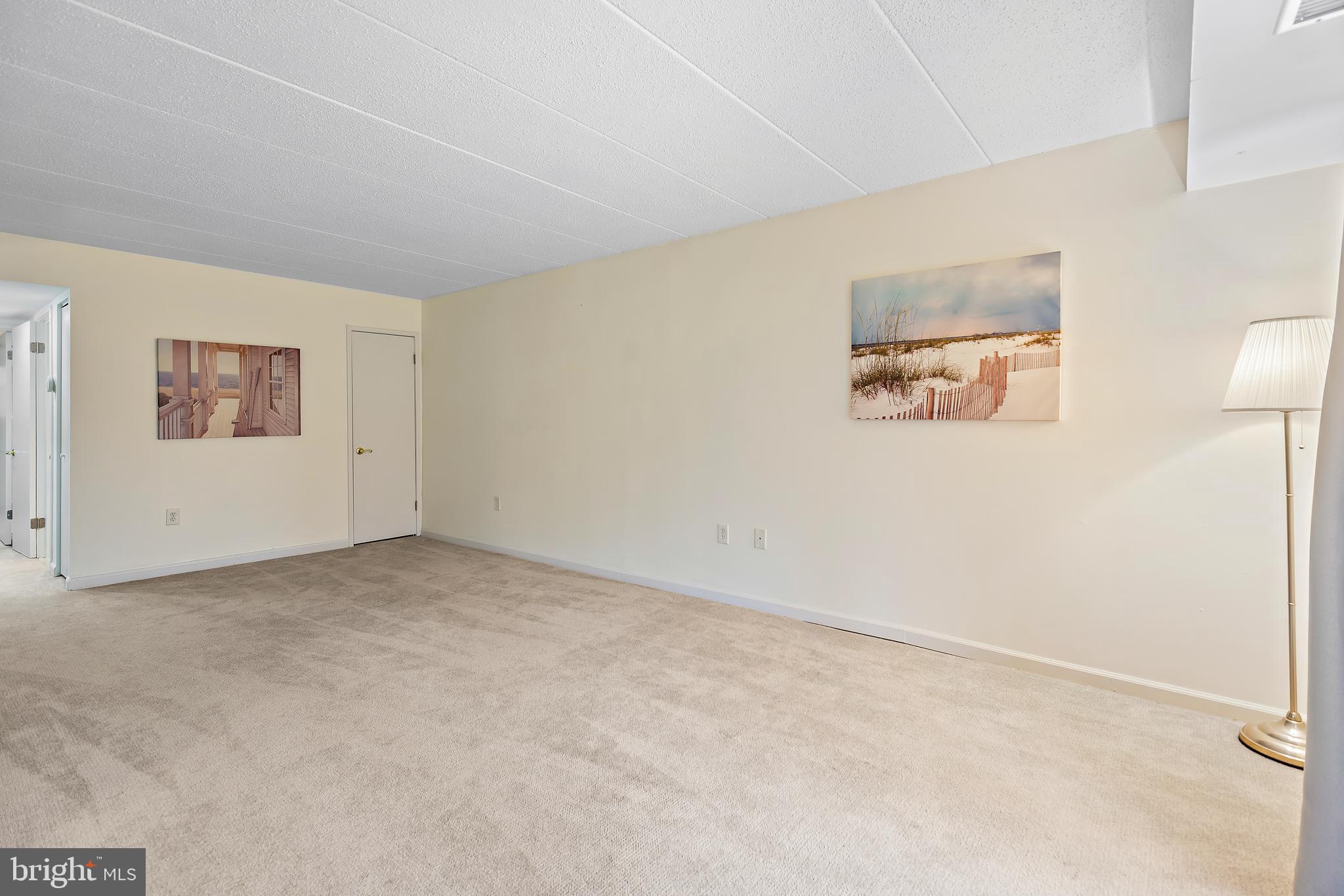 5707 Harpers Farm Road, Unit A Columbia, MD 21044 - Photo 8 of 30 a view of an empty room with a window