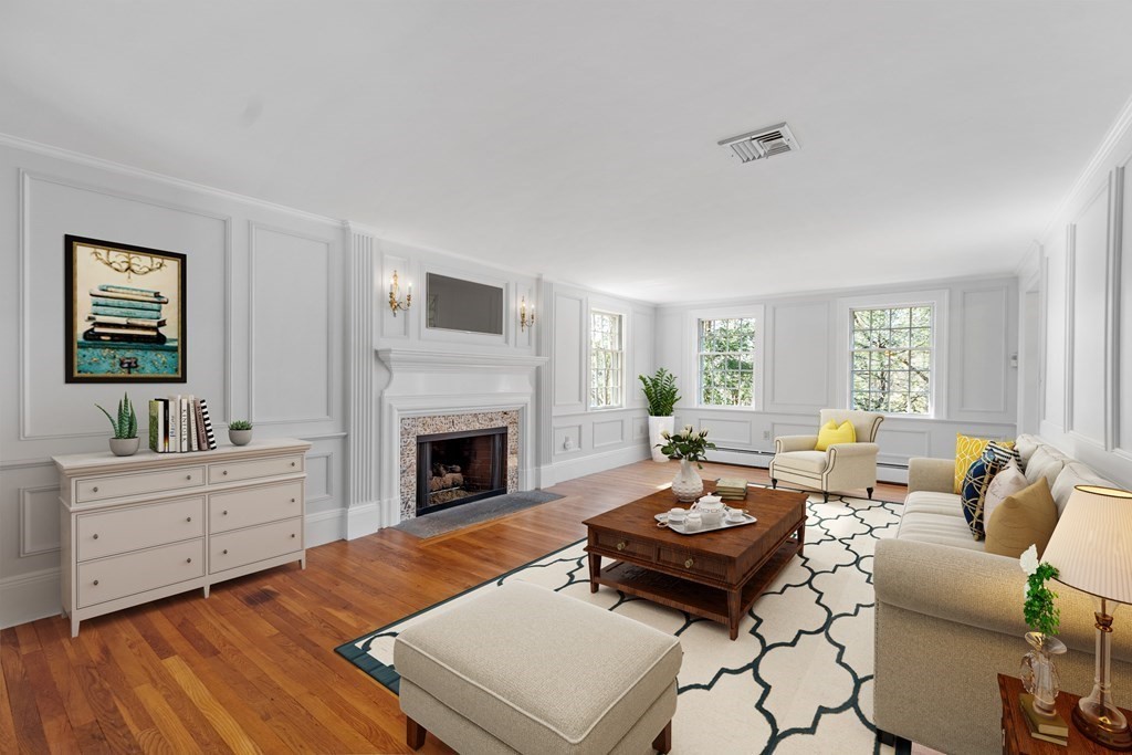 3 Goodwin Road Lexington, MA 02420 - Photo 12 of 38 a living room with furniture fireplace and window