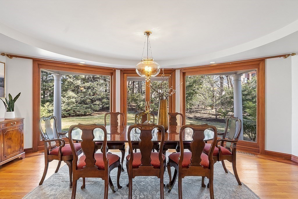 3 Goodwin Road Lexington, MA 02420 - Photo 14 of 38 a view of a dining room with furniture window and wooden floor