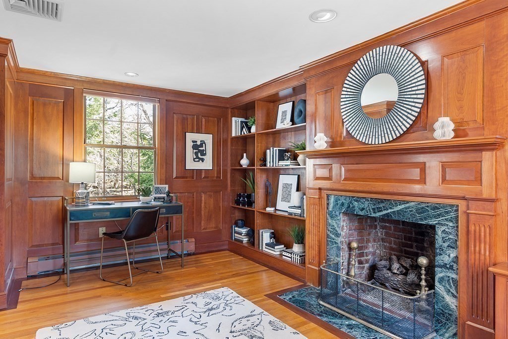 3 Goodwin Road Lexington, MA 02420 - Photo 18 of 38 a living room with furniture a window and a fireplace